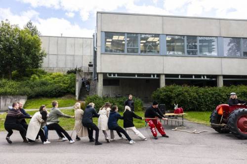 Tug of war student vs tractor