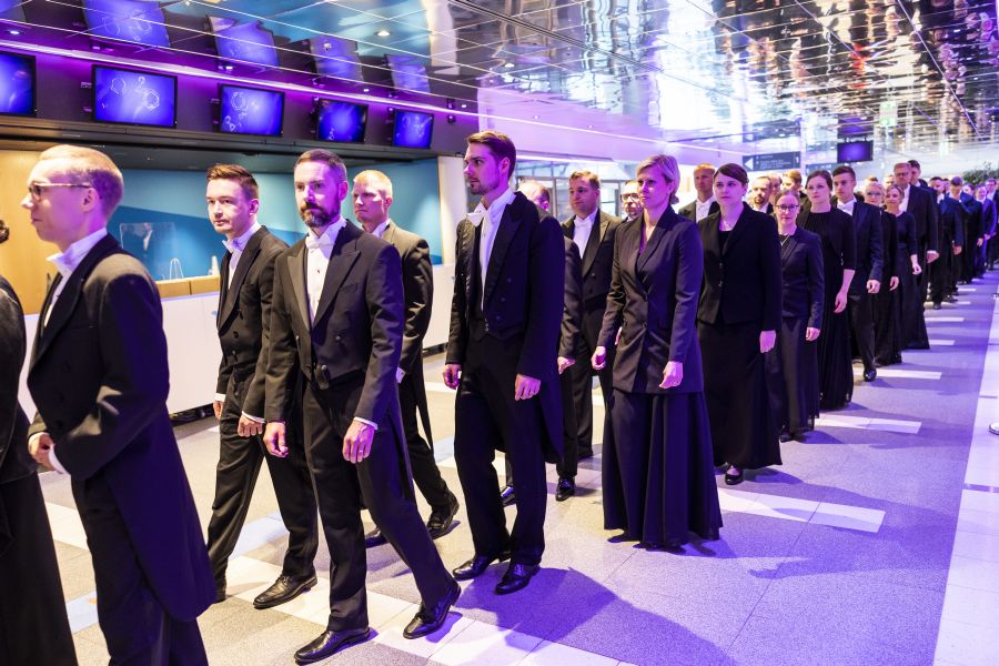 Conferrees arrive in a procession