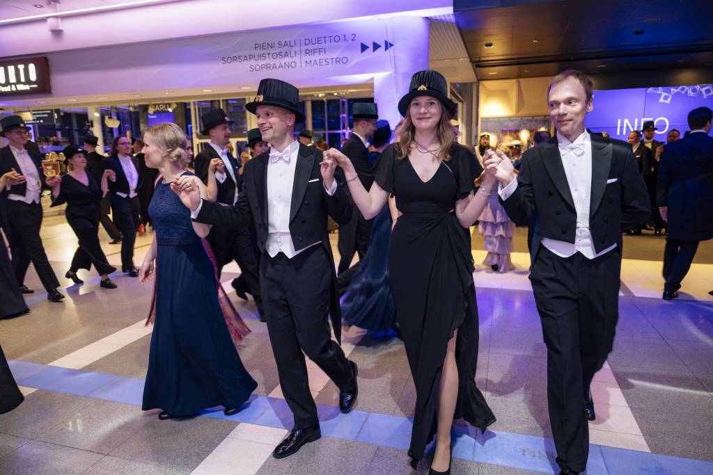 Doctors and their companions dancing